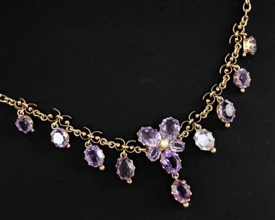 A late Victorian gold, seed pearl and amethyst drop necklace, 17in.